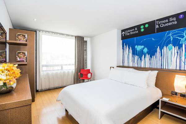 Clásica Pettite una cama Hotel Viaggio Nueve Trez en Bogotá