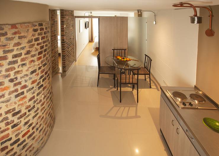 Suite familiar de dos habitaciones - 1 cama doble y 2 sencillas Hotel Viaggio Urbano Bogotá